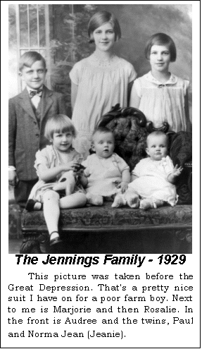 Text Box:  The Jennings Family - 1929
This picture was taken before the Great Depression. That's a pretty nice suit I have on for a poor farm boy. Next to me is Marjorie and then Rosalie. In the front is Audree and the twins, Paul and Norma Jean (Jeanie).
